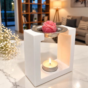 White wax burner with pink wax melt